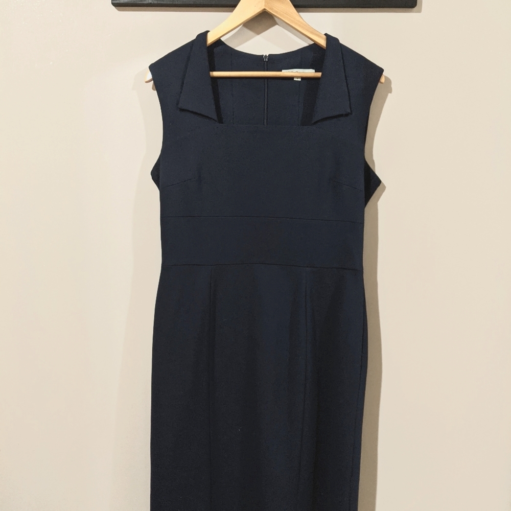 Gorgeous fitted navy dress with square neckline. Size medium from Cleo petites.